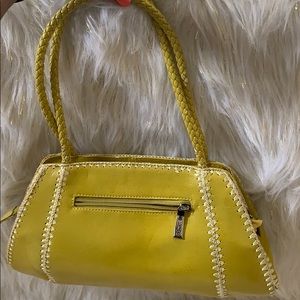 Small yellow hand bag
